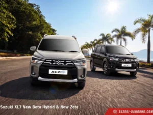 Suzuki XL7 dari sudut depan-samping, menonjolkan desain SUV modern dan gagah.
