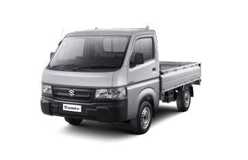 Suzuki Carry pick-up warna silver terbaru terparkir rapi.