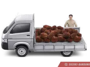 Suzuki Carry Pick Up model terbaru warna putih, cocok untuk berbagai keperluan niaga.