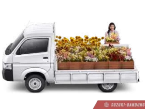 Suzuki Carry Pick Up terbaru warna putih, tampak depan dan samping.